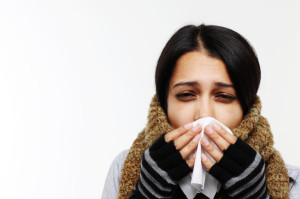 sick woman iStock
