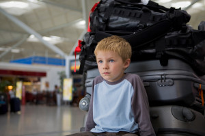boy in airport iStock