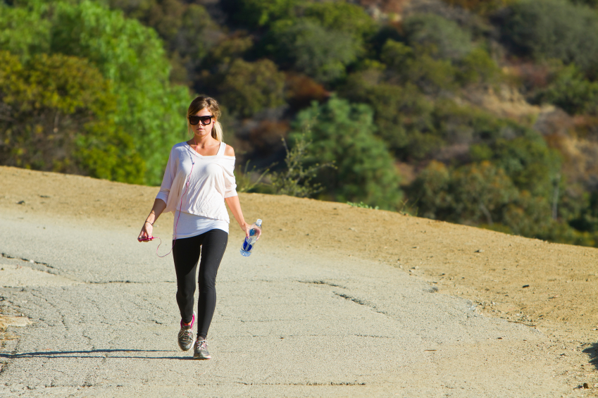 Young Woman Hikes In The Early Morning