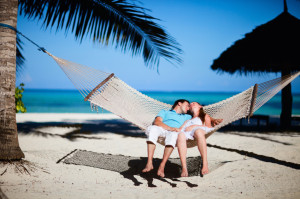 Romantic couple relaxing in hammock