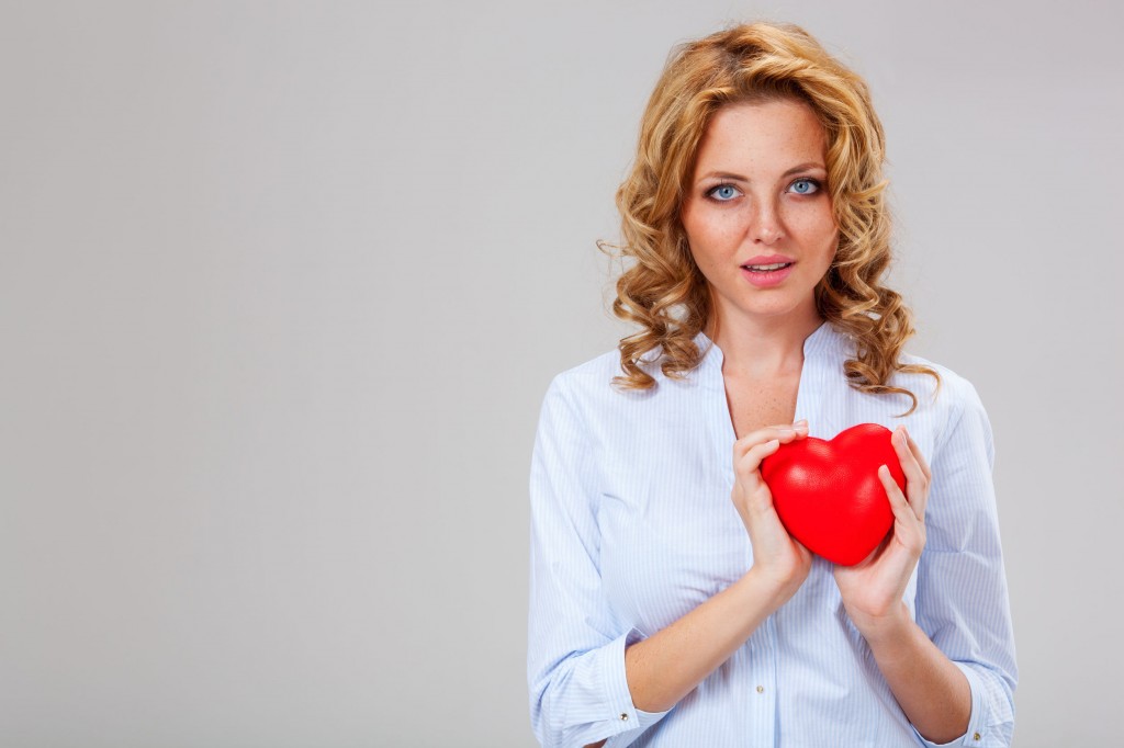 woman holding heart