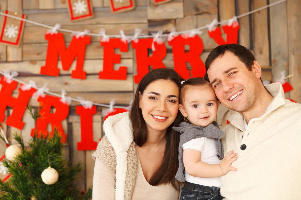 family posing for christmas photo