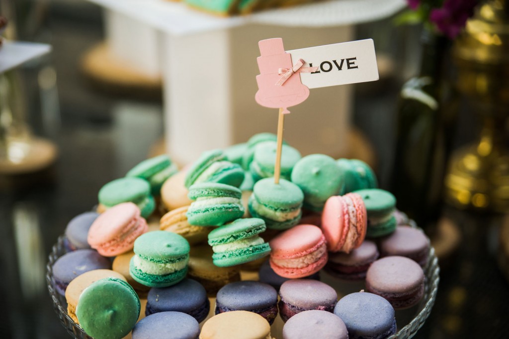 assorted macaroons piled on a dish