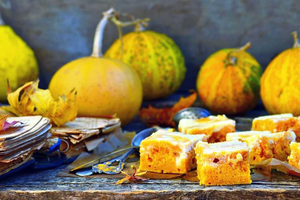 pumpkin pie about cream cheese on an autumn background