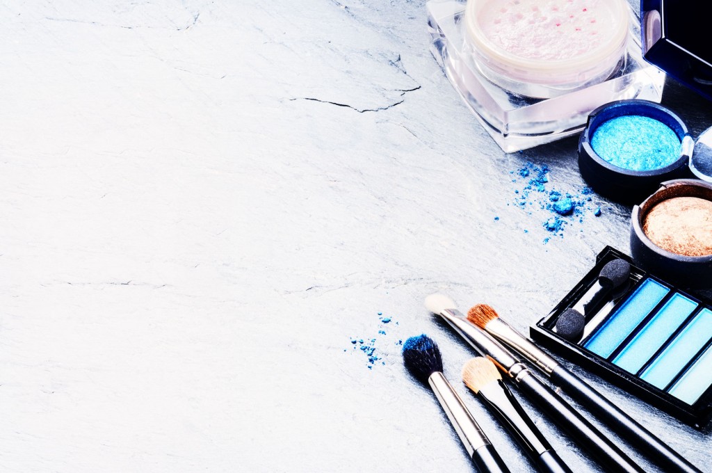 makeup brushes on white background